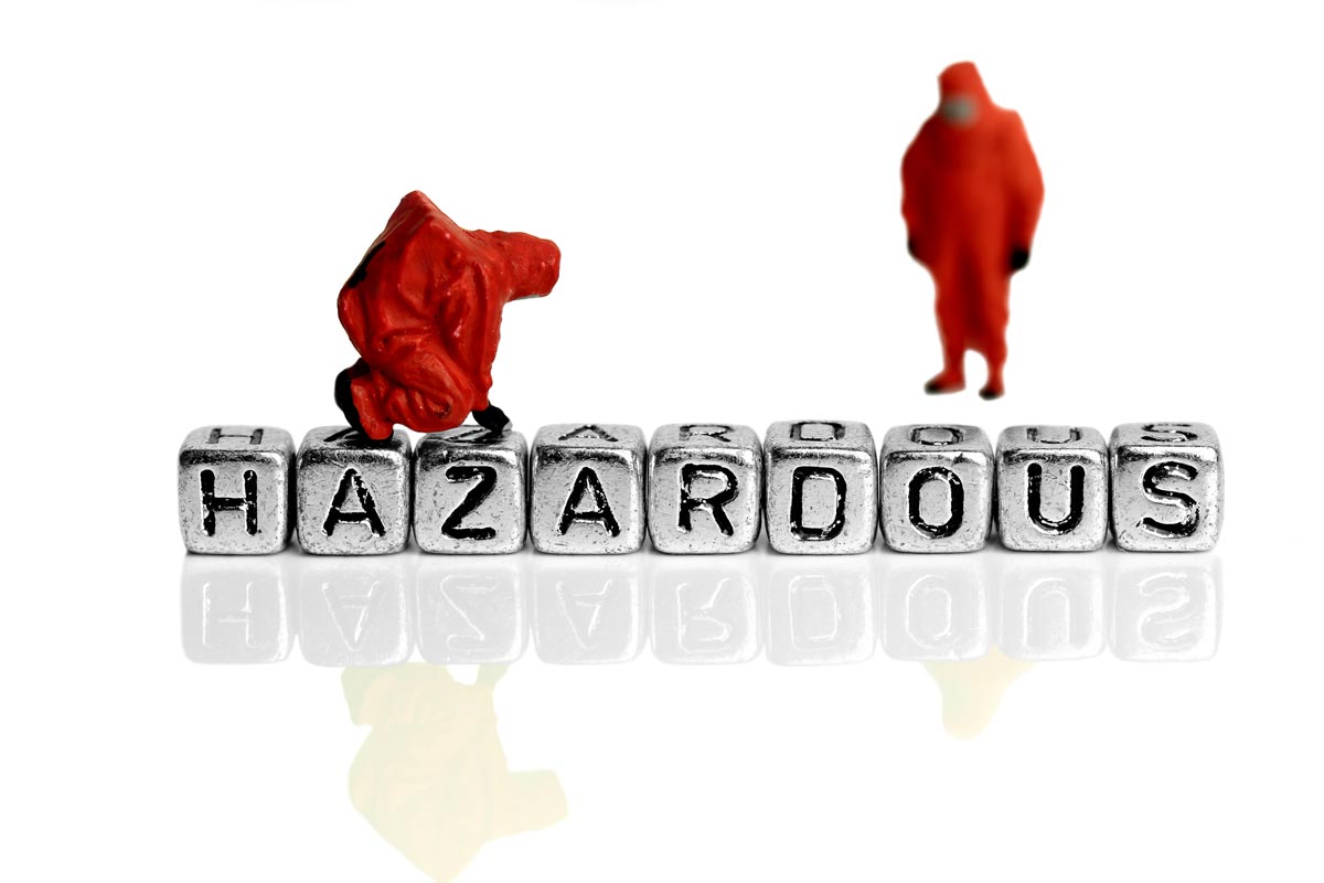 hazardous location with two workers in suits