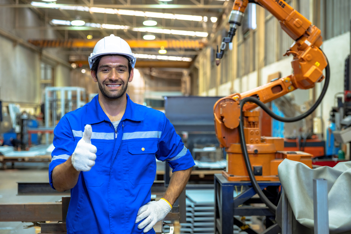Young worker working in industry factory. Spike Electric Building in Houston TX